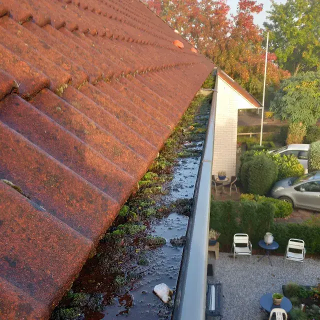 Dakgoot schoonmaken zonder ladder